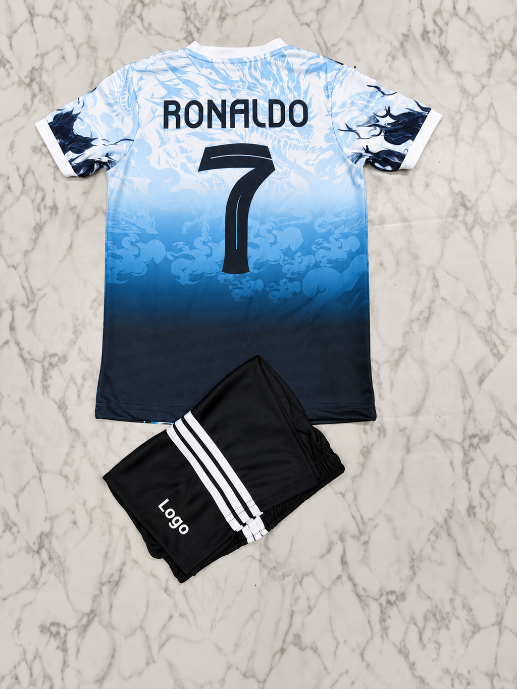 Real Madrid Blue Fire Dragon Kids India Football Jersey Set (Jersey + Shorts)