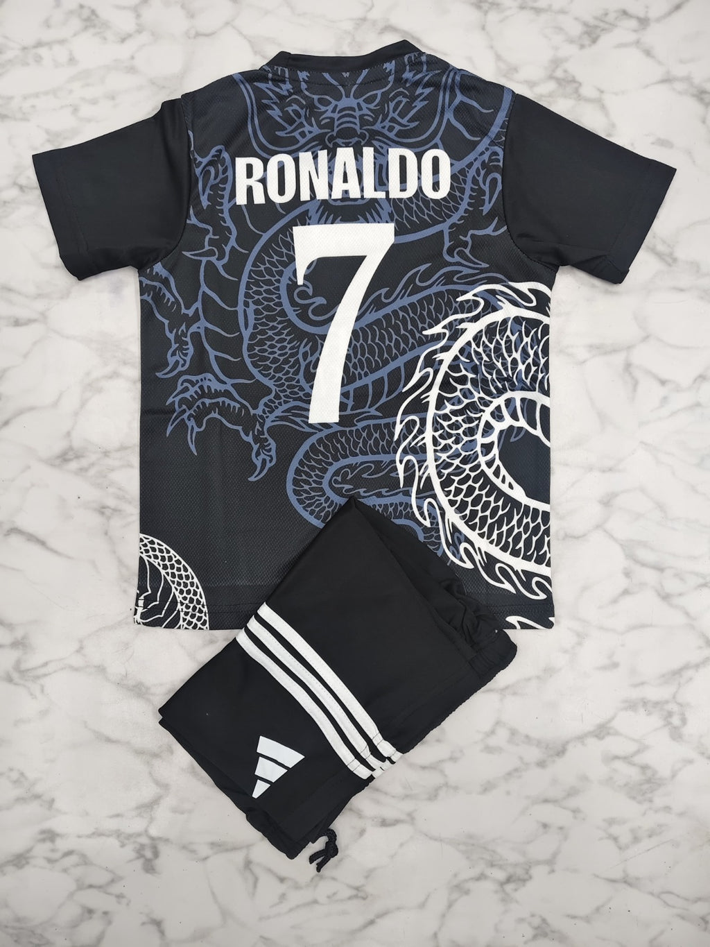 Real Madrid Black Dragon 25/26 Kids India Football Jersey Set (Jersey + Shorts)