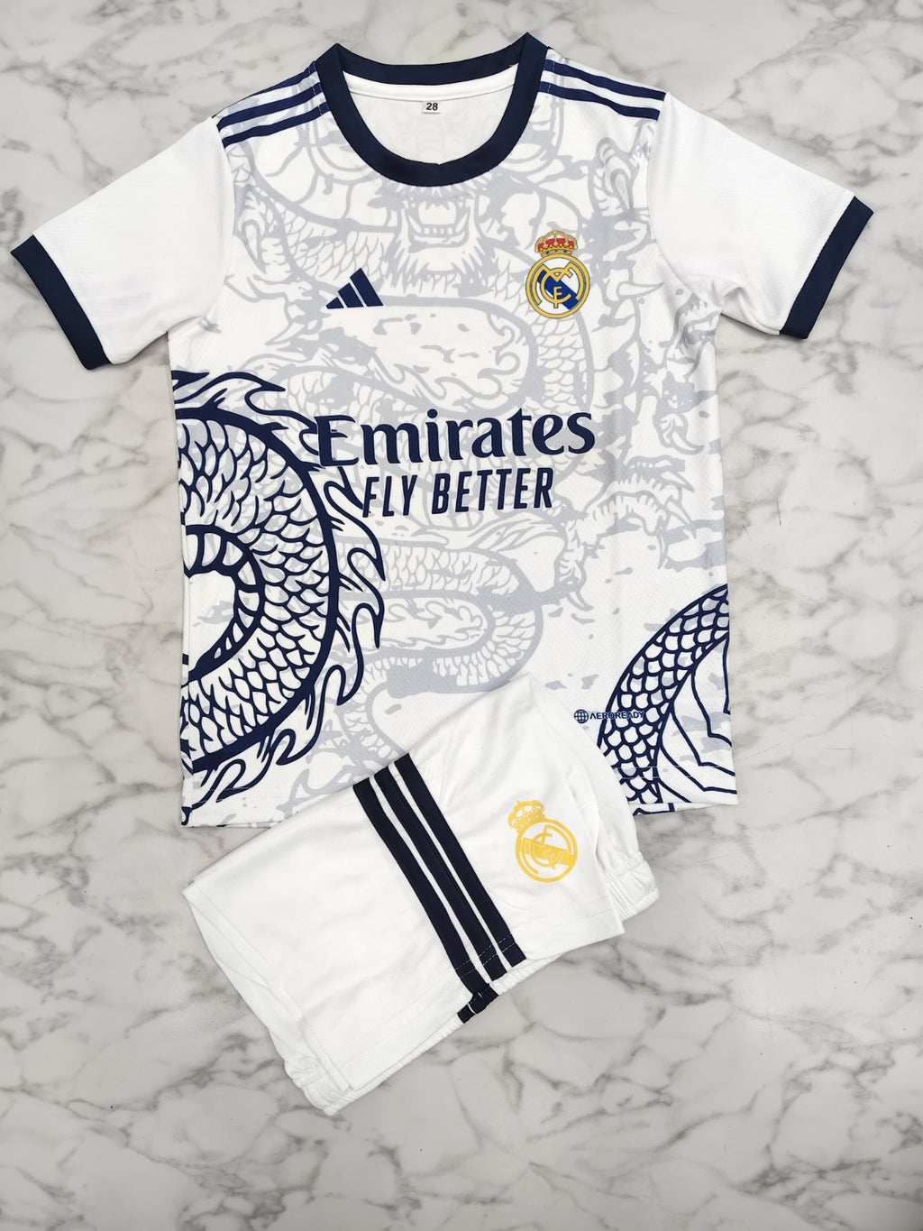 Real Madrid White Dragon 25/26 Kids India Football Jersey Set (Jersey + Shorts)
